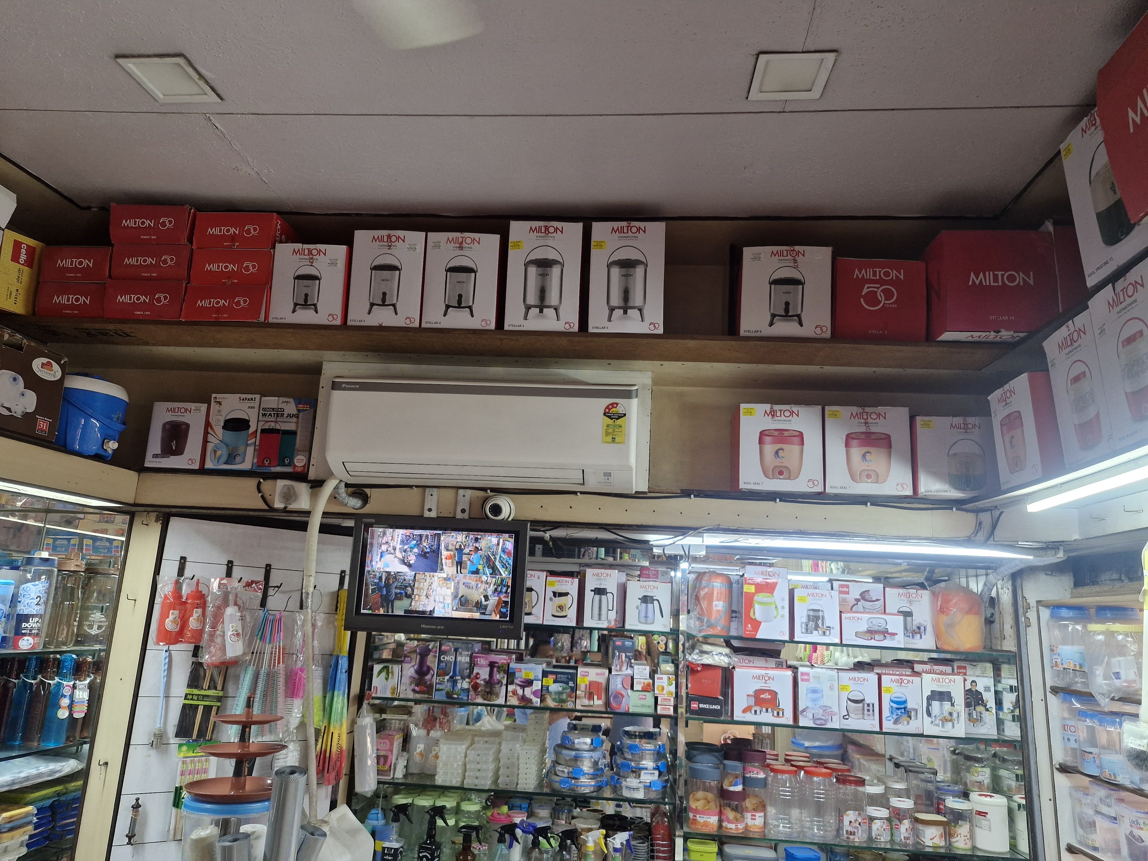 Interior store shelving with Milton brand products and packaging