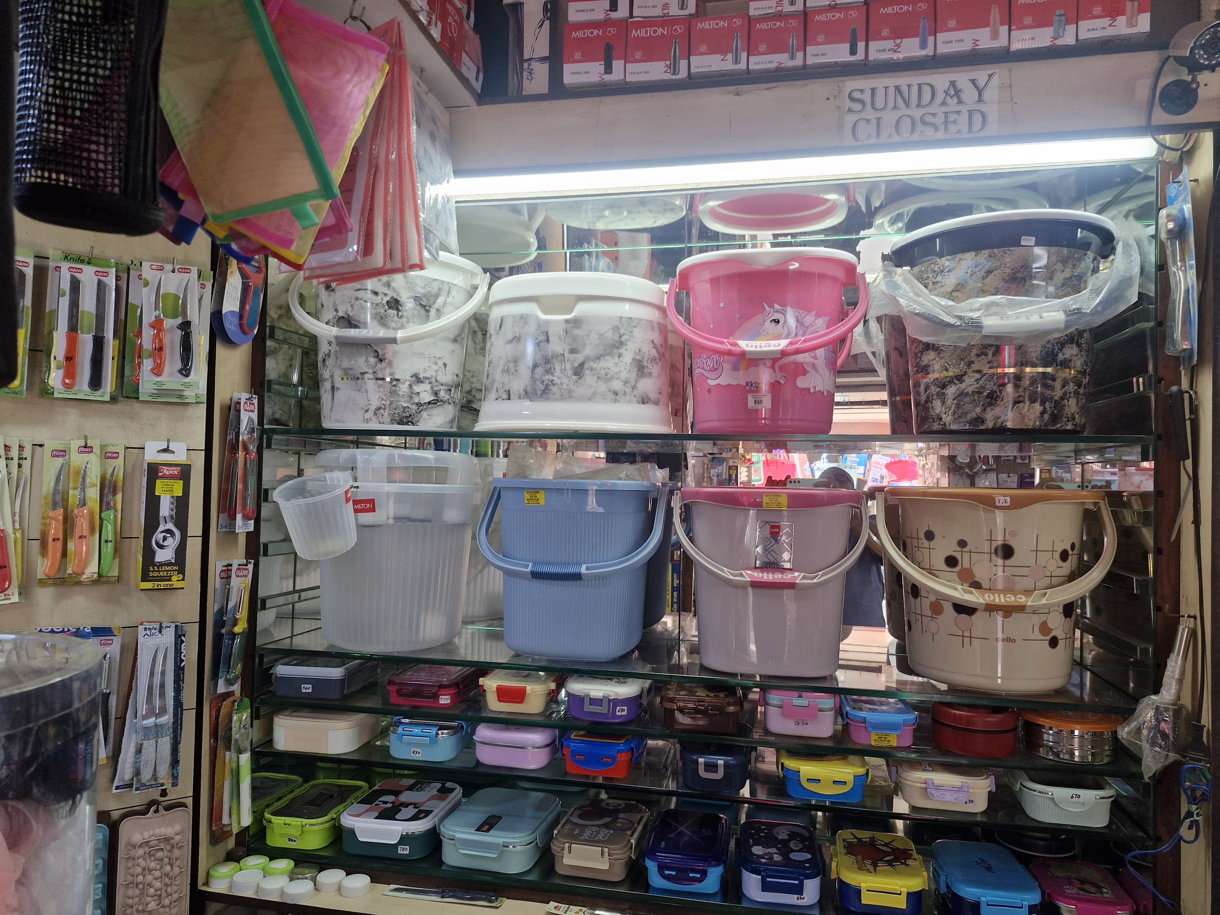 Colorful lunch boxes and storage containers display